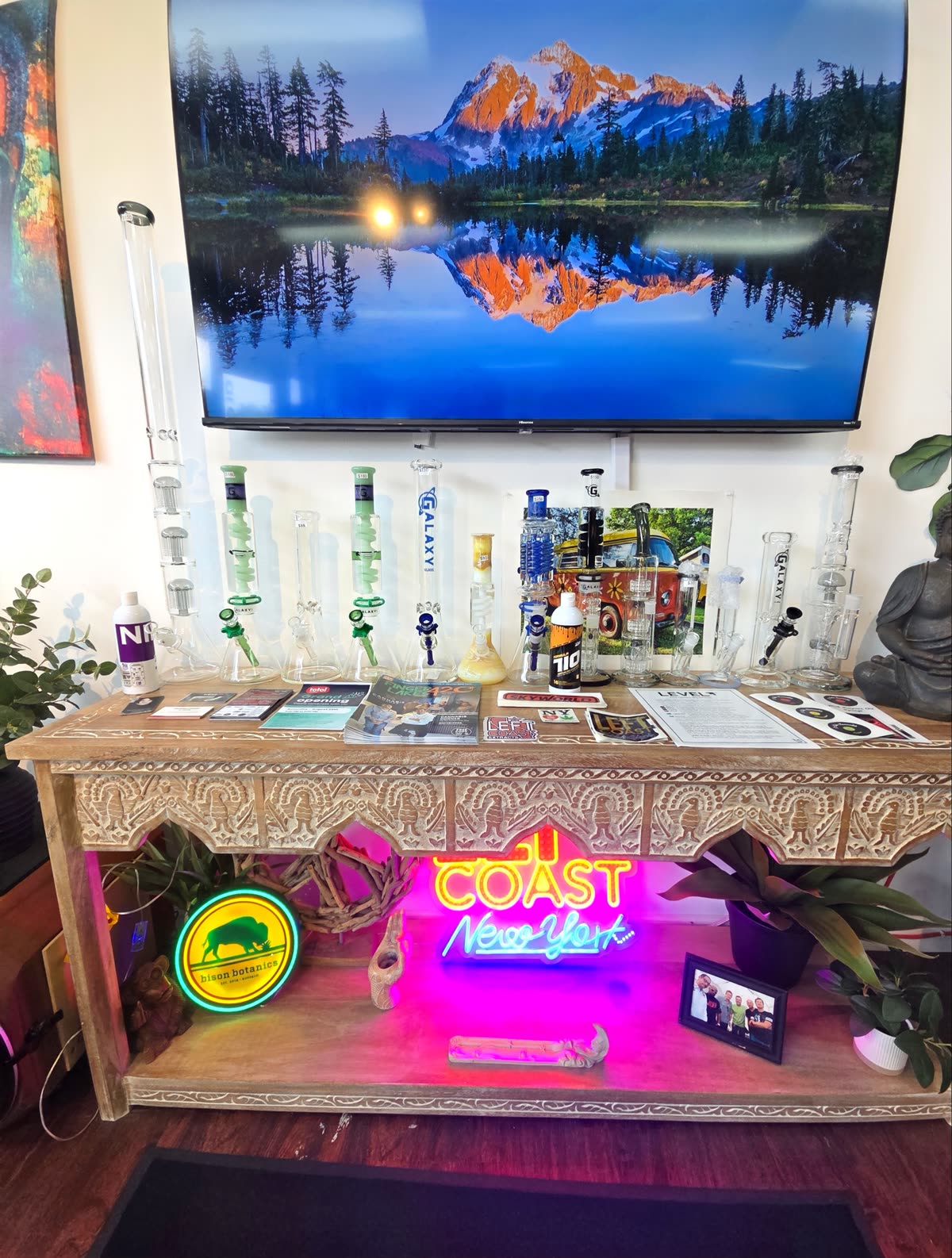 The glass display at Aroma under the neon sign